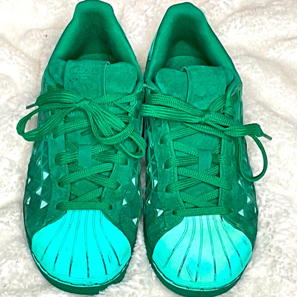 Reflective bright green Adidas Superstars